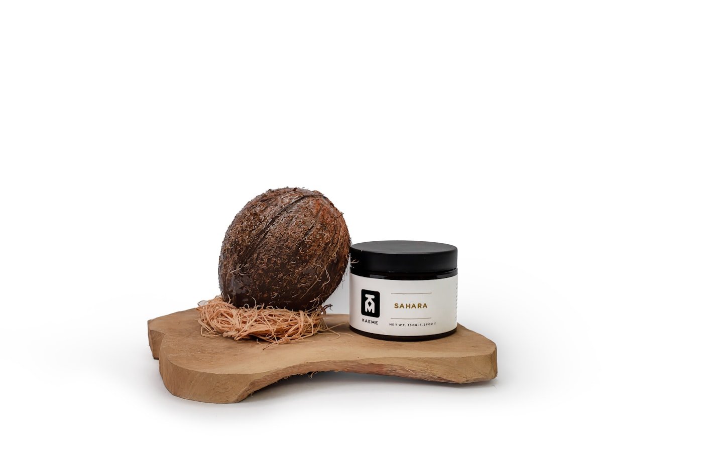Body butter jars on a wooden board
