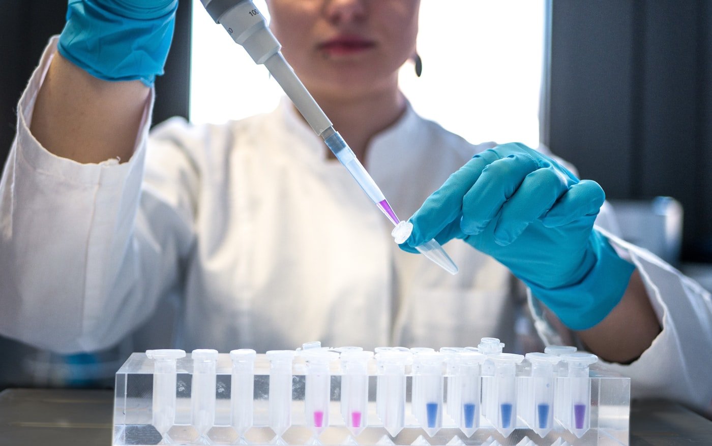 Technician testing a sample in a laboratory